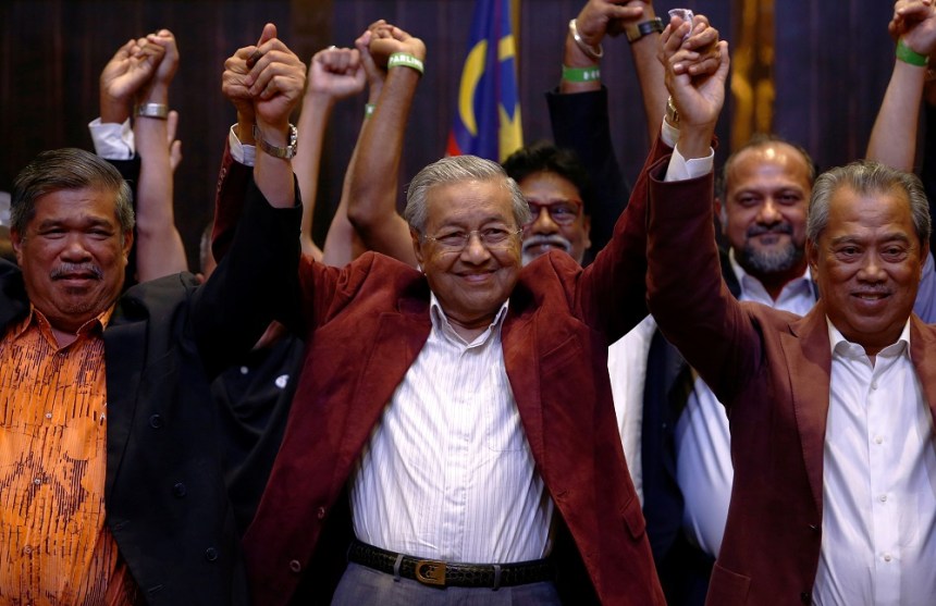 Mahathir Mohamad reacts during a news conference after general election, in Petaling Jaya
